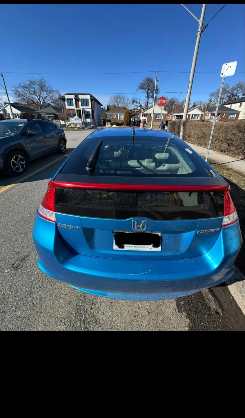 Blue Honda Insight Hybrid - photo 5