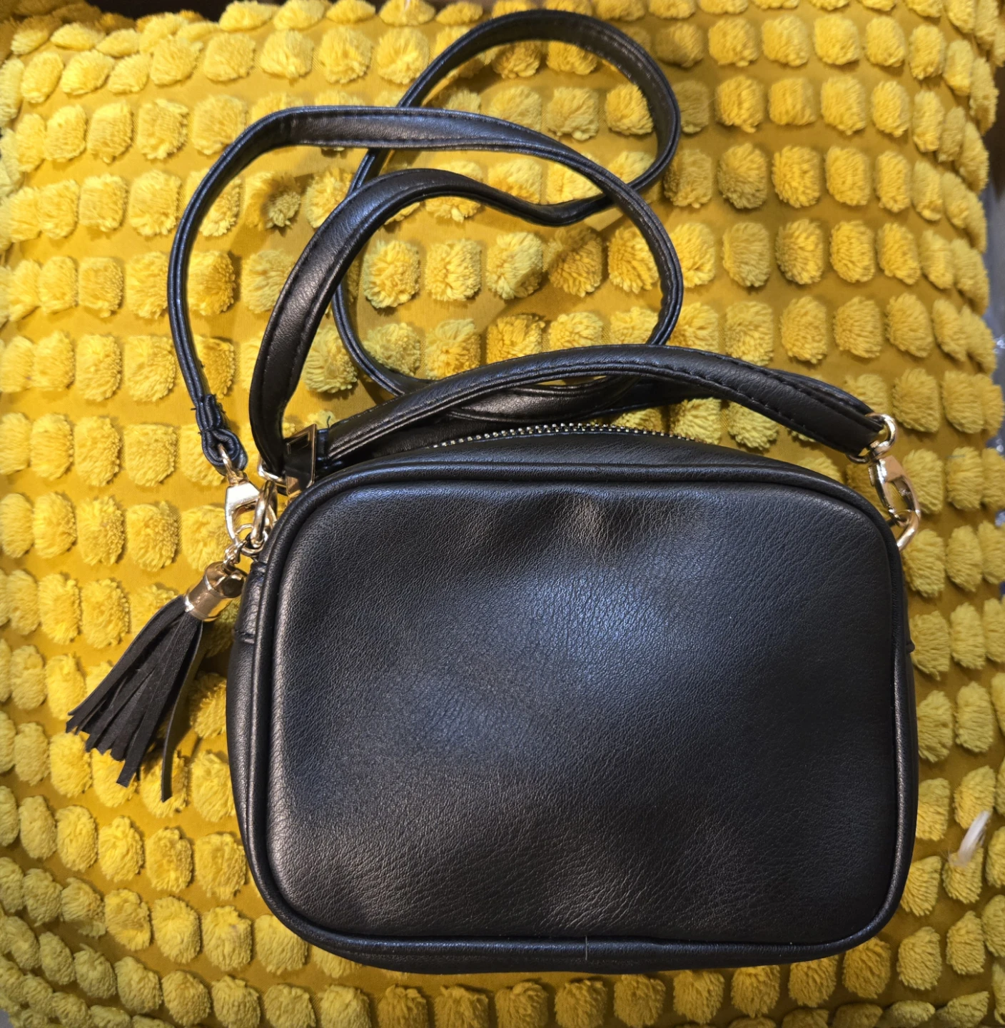 Black crossbody bag with gold studs and tassel - photo 2