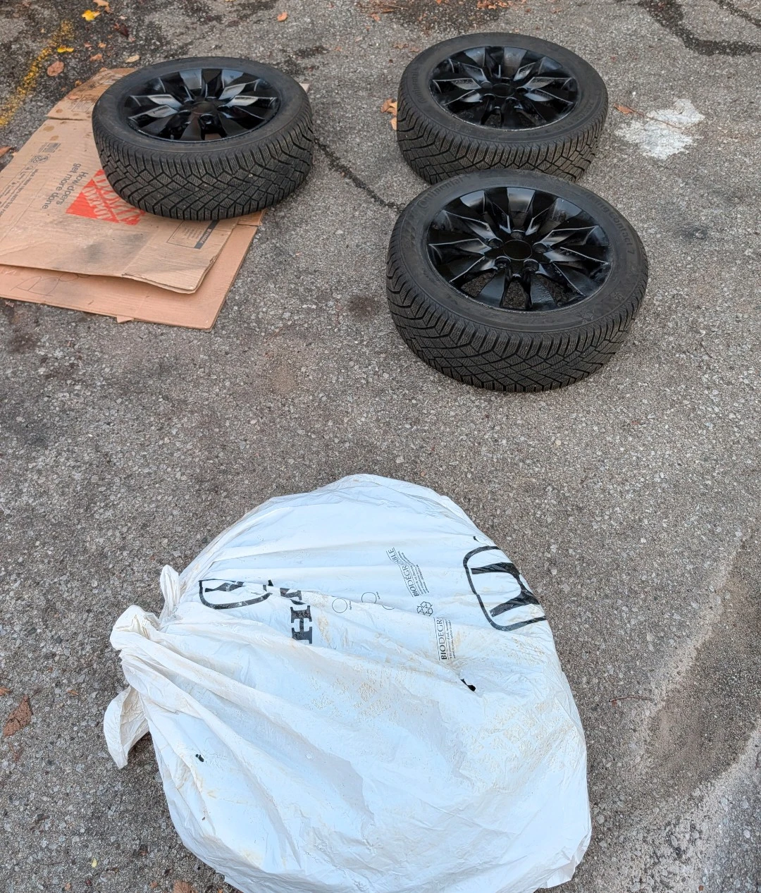 Continental VikingContact7 4 Winter tires with Rims on.