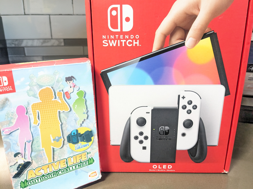 Nintendo Switch OLED System + Active Life Game