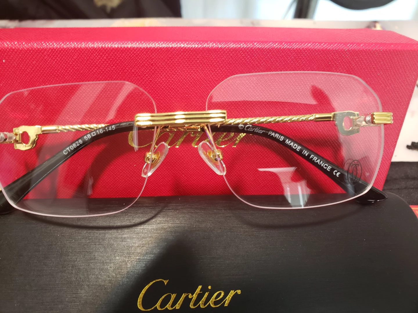 Cartier CT0028 Eyeglasses - Gold/Black Rimless 58-16-145 - photo 2