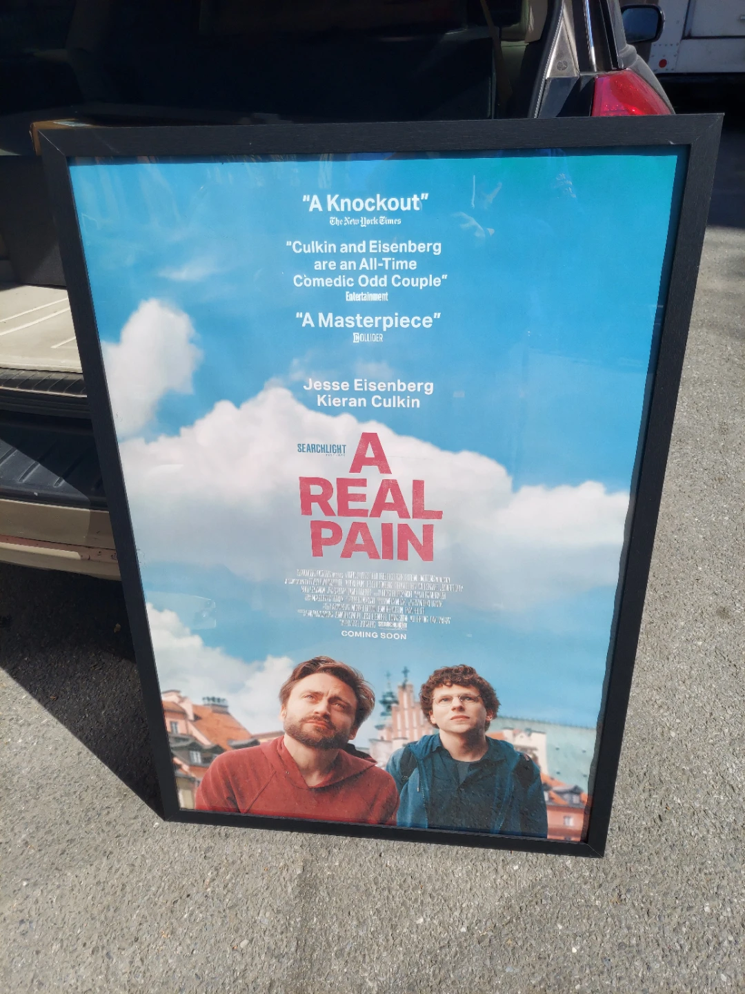 A Real Pain Movie Poster