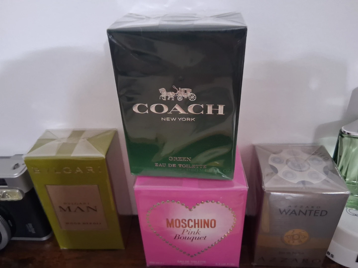 Coach New York ,Azzaro,bvlgary,Moschino