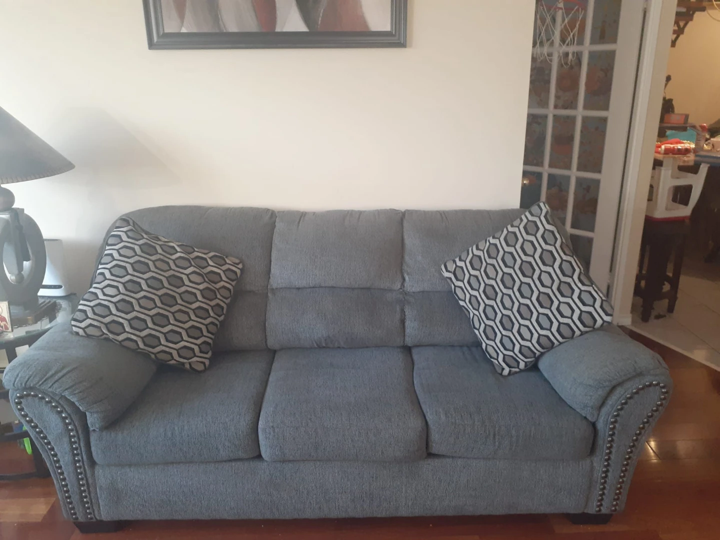 Grey Sofa with Studded Accents