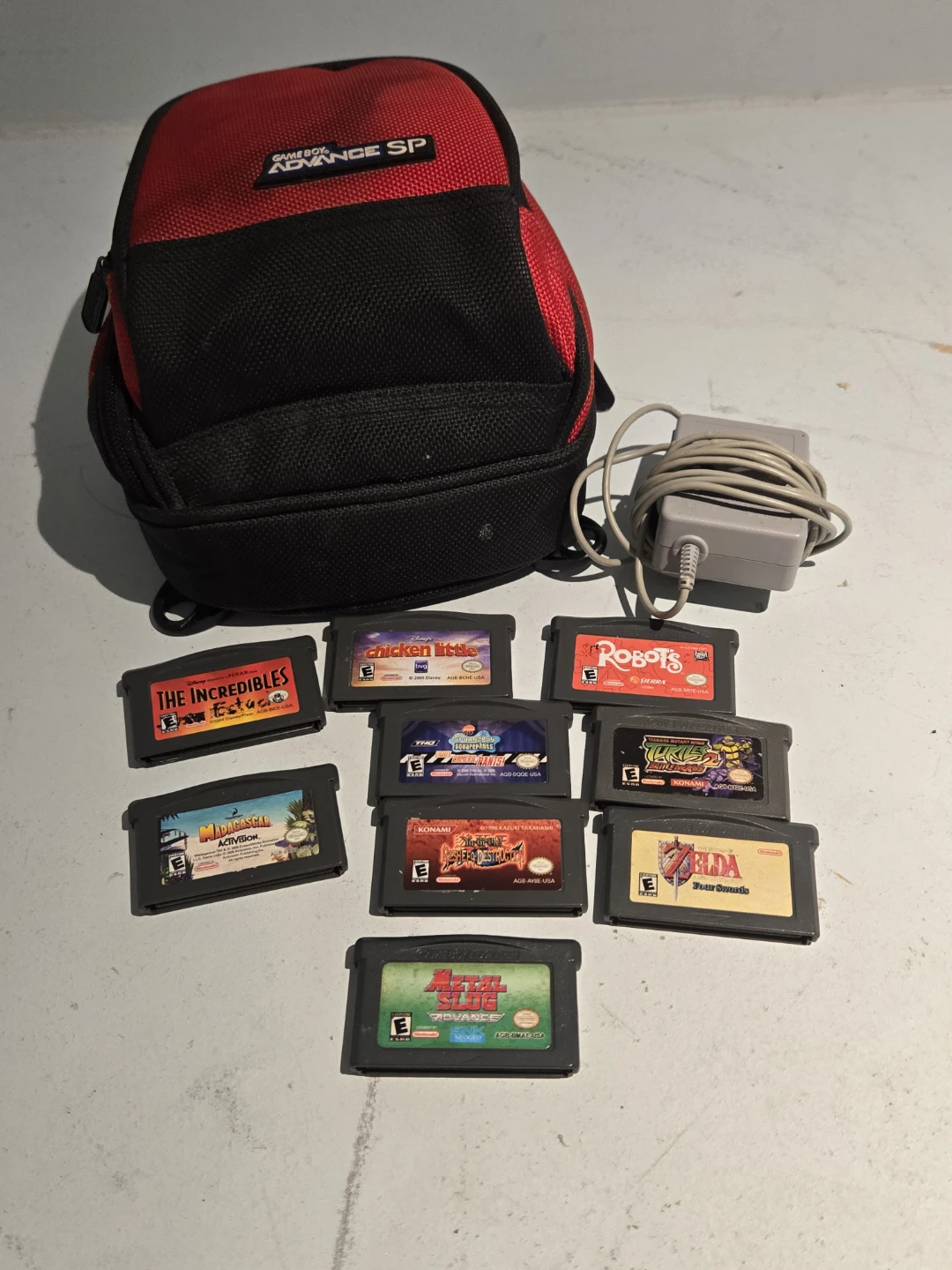 Game Boy Advance SP Carrying Case with Charger and Games