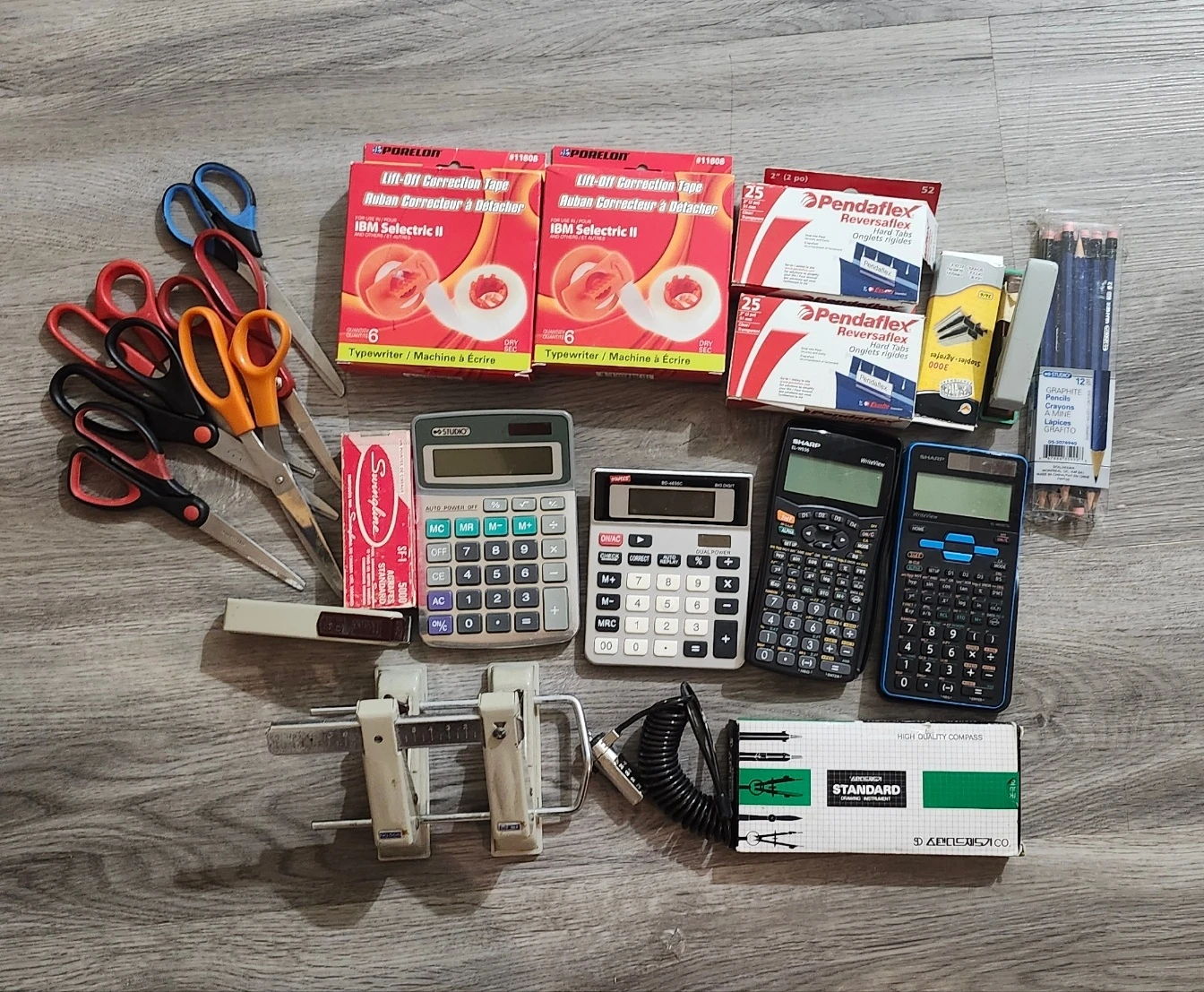 Assorted Office Supplies: Calculators, Scissors, Pencils,