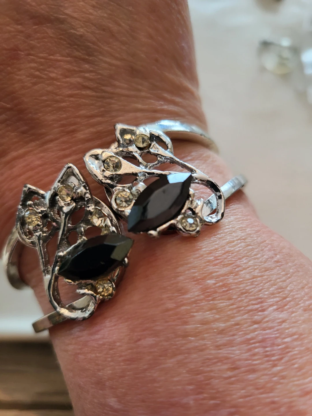 Silver-tone cuff bracelet with black marquise stones