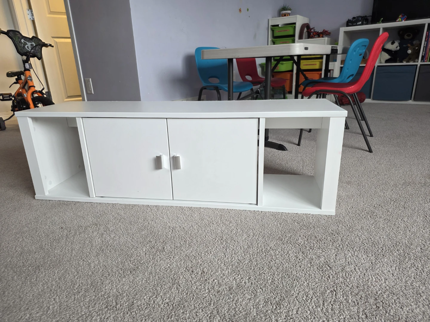 White media console with cabinet doors