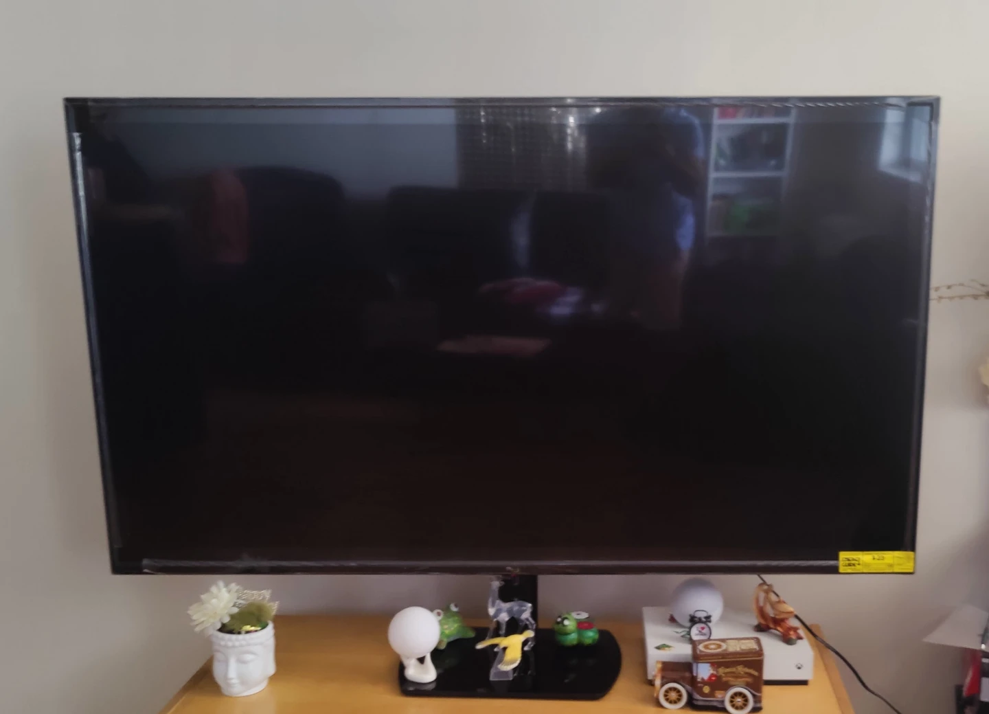 RCA 65 Inch 4K UHD LED flat Smart TV with table top stand