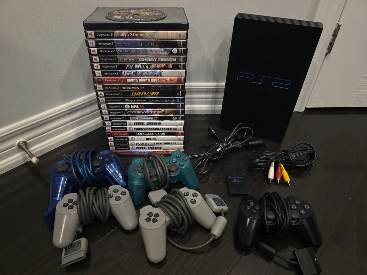 Playstation 2 with 21 games, 5 controllers, 1 memory card