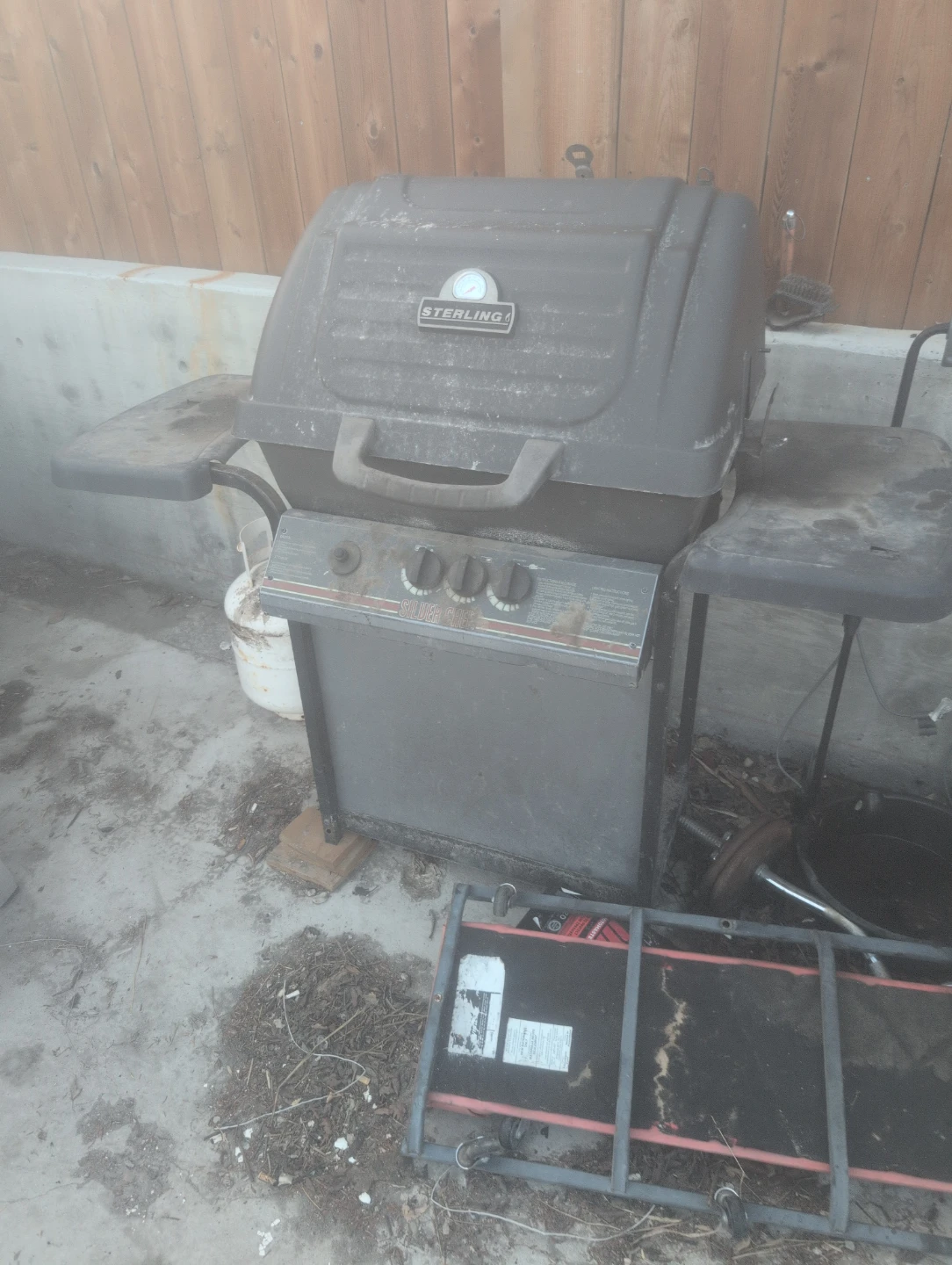 Sterling Propane Grill with propane tank