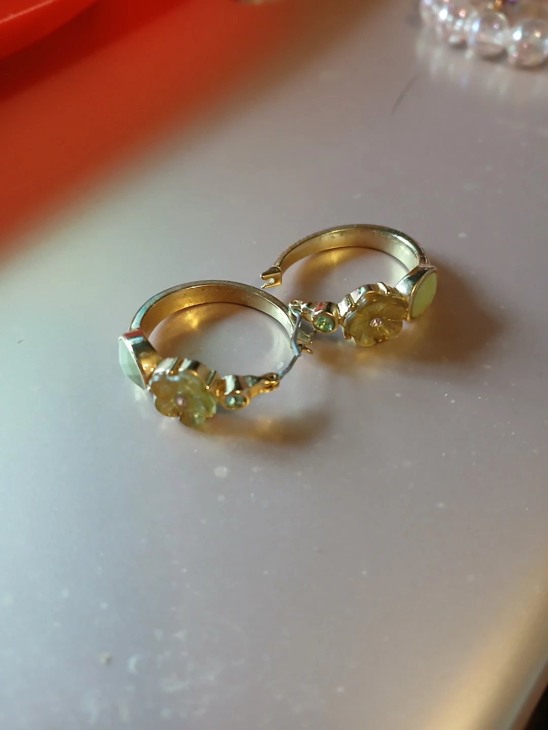 Gold Hoop Earrings with Flower Detail