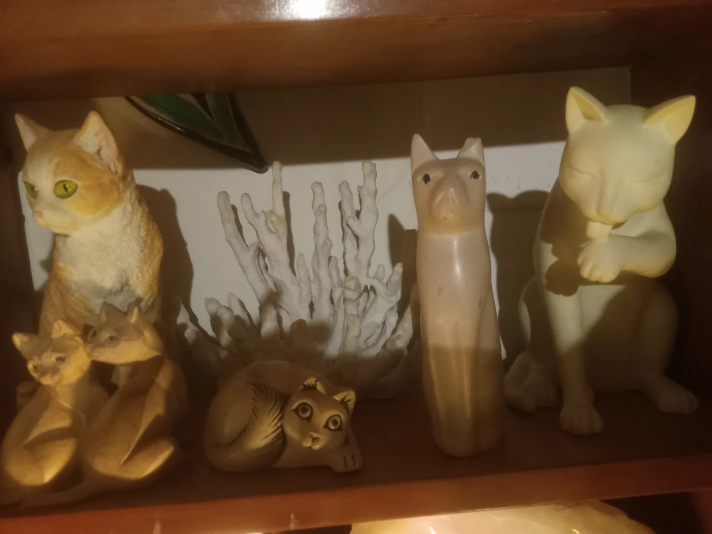 Collection of assorted cat figurines