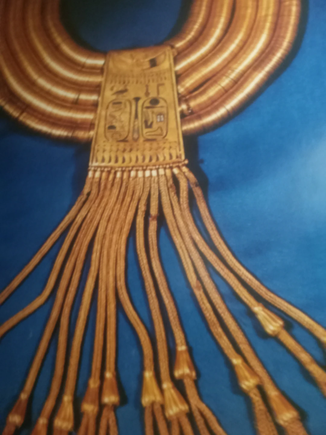 Egyptian-style gold collar necklace with hieroglyphs print