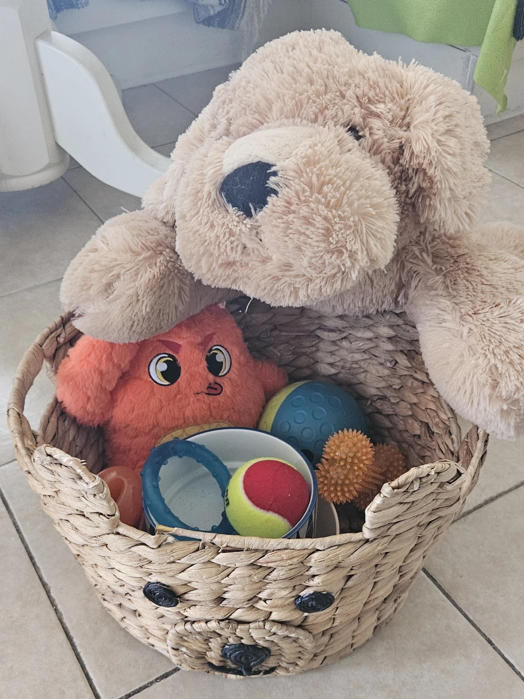 Woven Dog Toy Basket with Plush and Various Toys