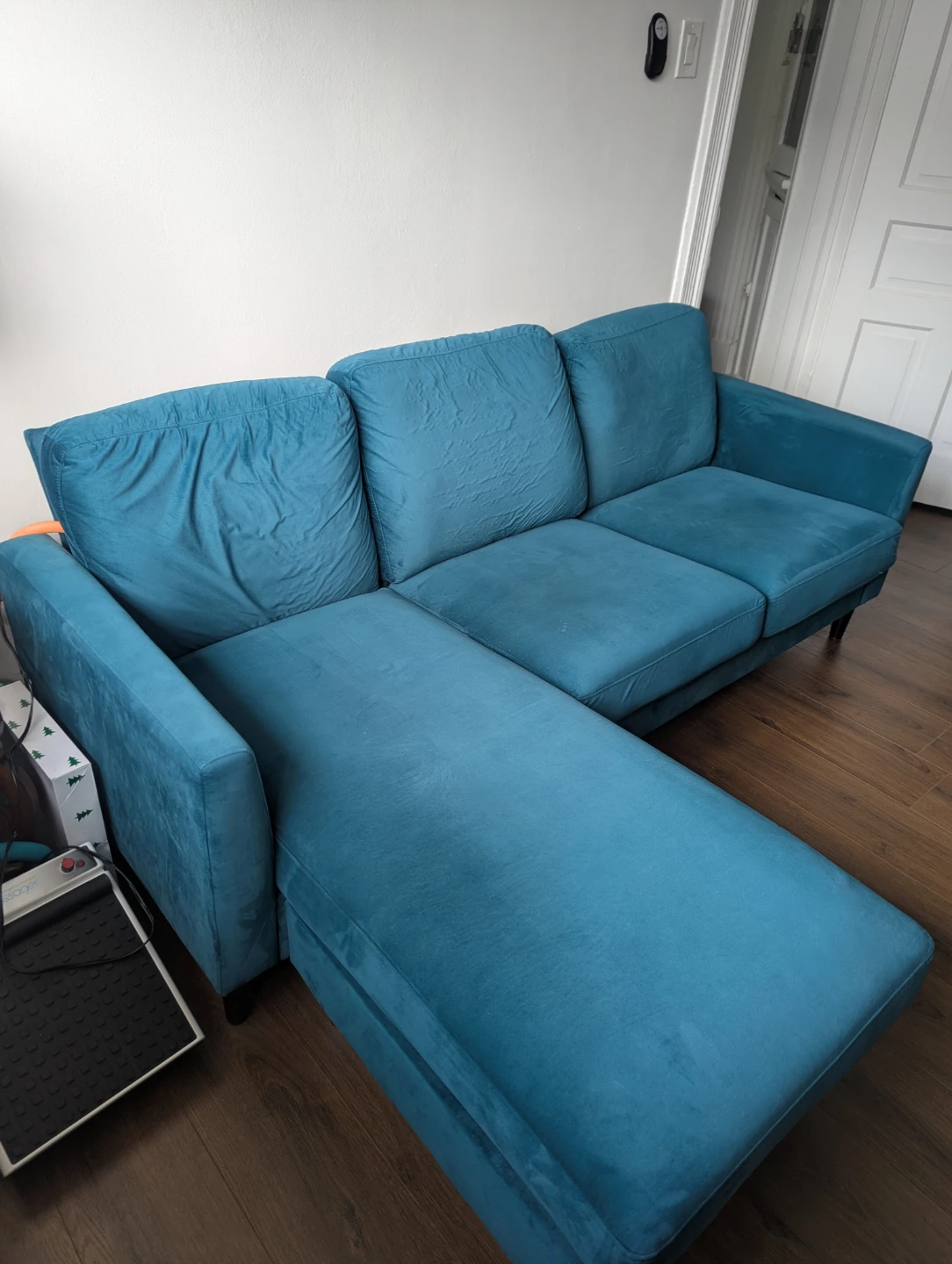 Teal L shaped sofa couch