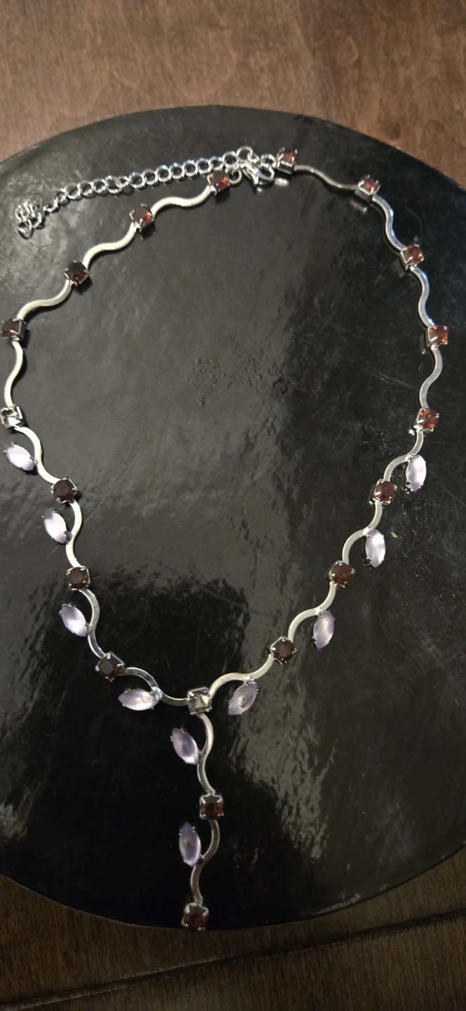 Silver-tone necklace with purple and red stones
