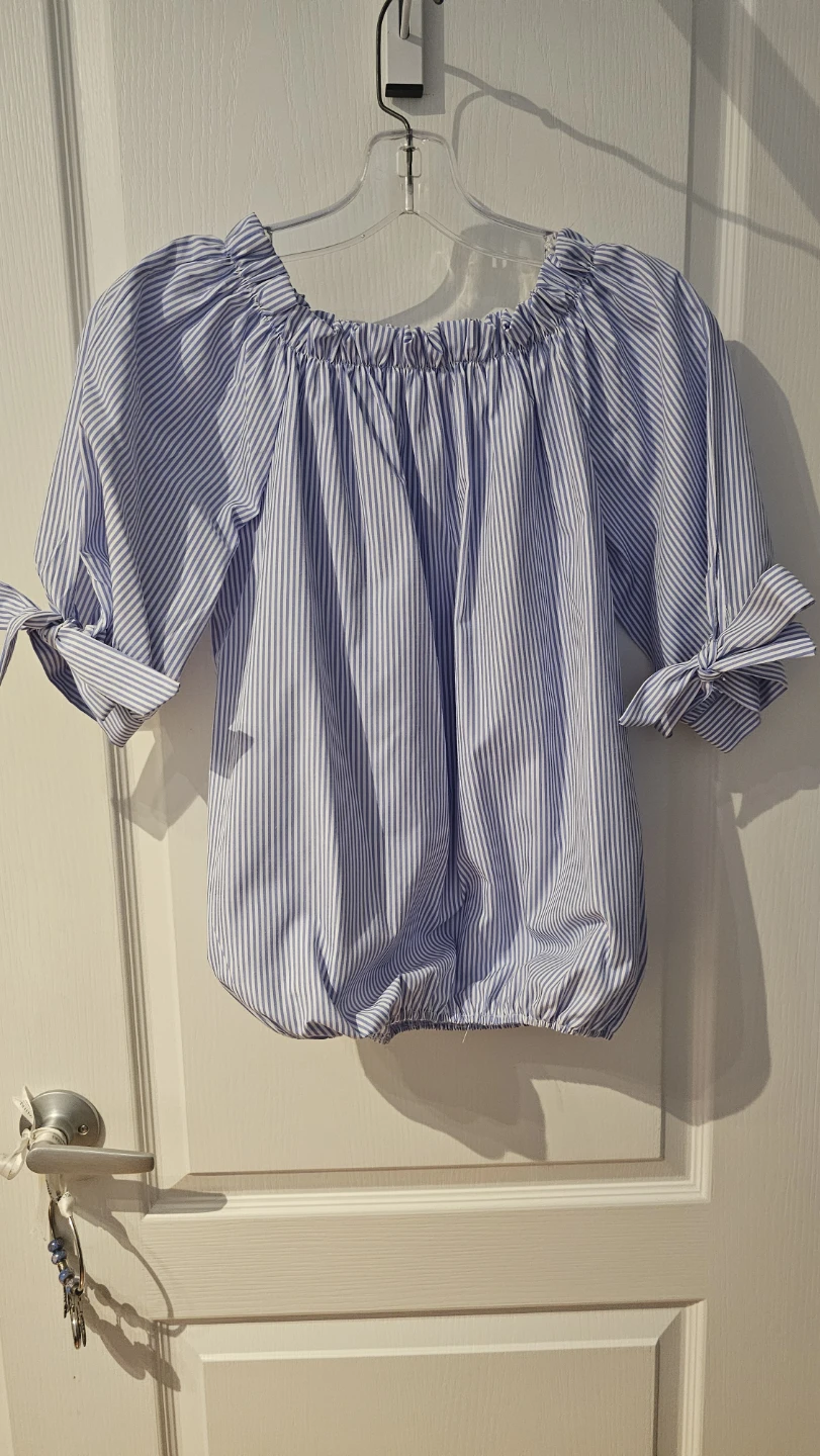 Blue and white striped off-the-shoulder blouse