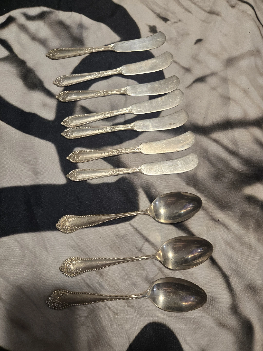 Set of 7 Silver-Plated Butter Knives and 3 Spoons