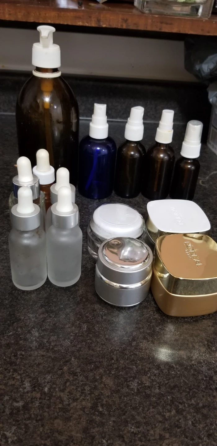 Assorted Empty Cosmetic Bottles and Jars