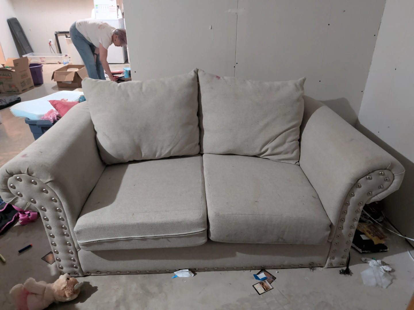 Beige Loveseat with Studded Arms