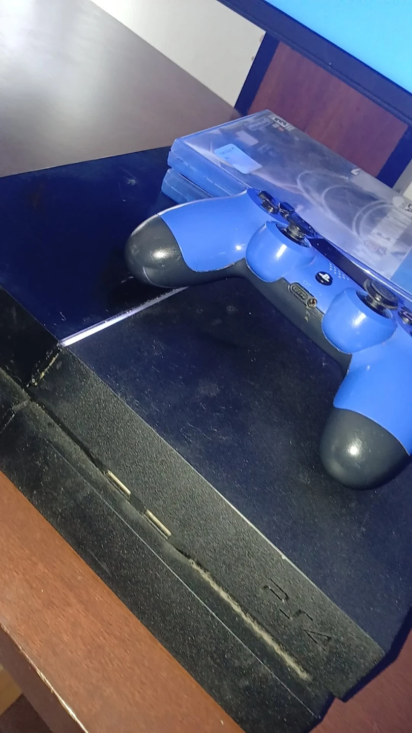 PlayStation 4 Console with Controller and Games