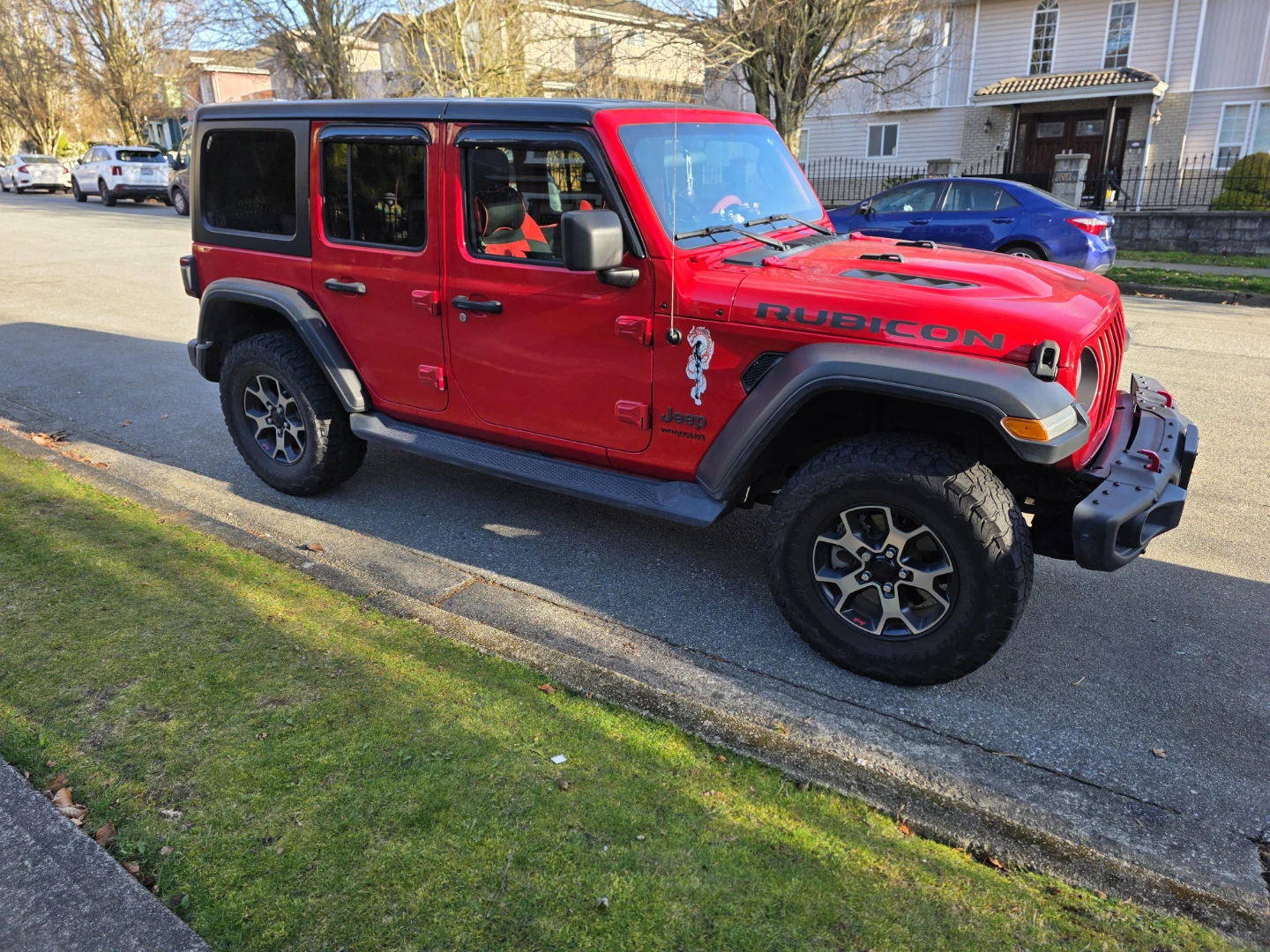 Red Jeep Wrangler Rubicon 4-door