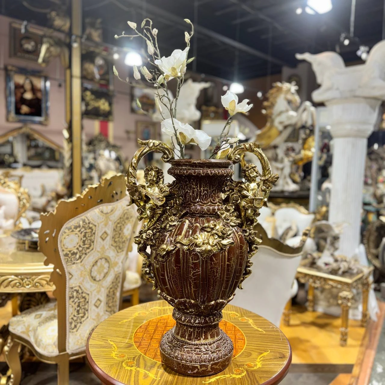 Ornate Decorative Vase with Cherub Accents