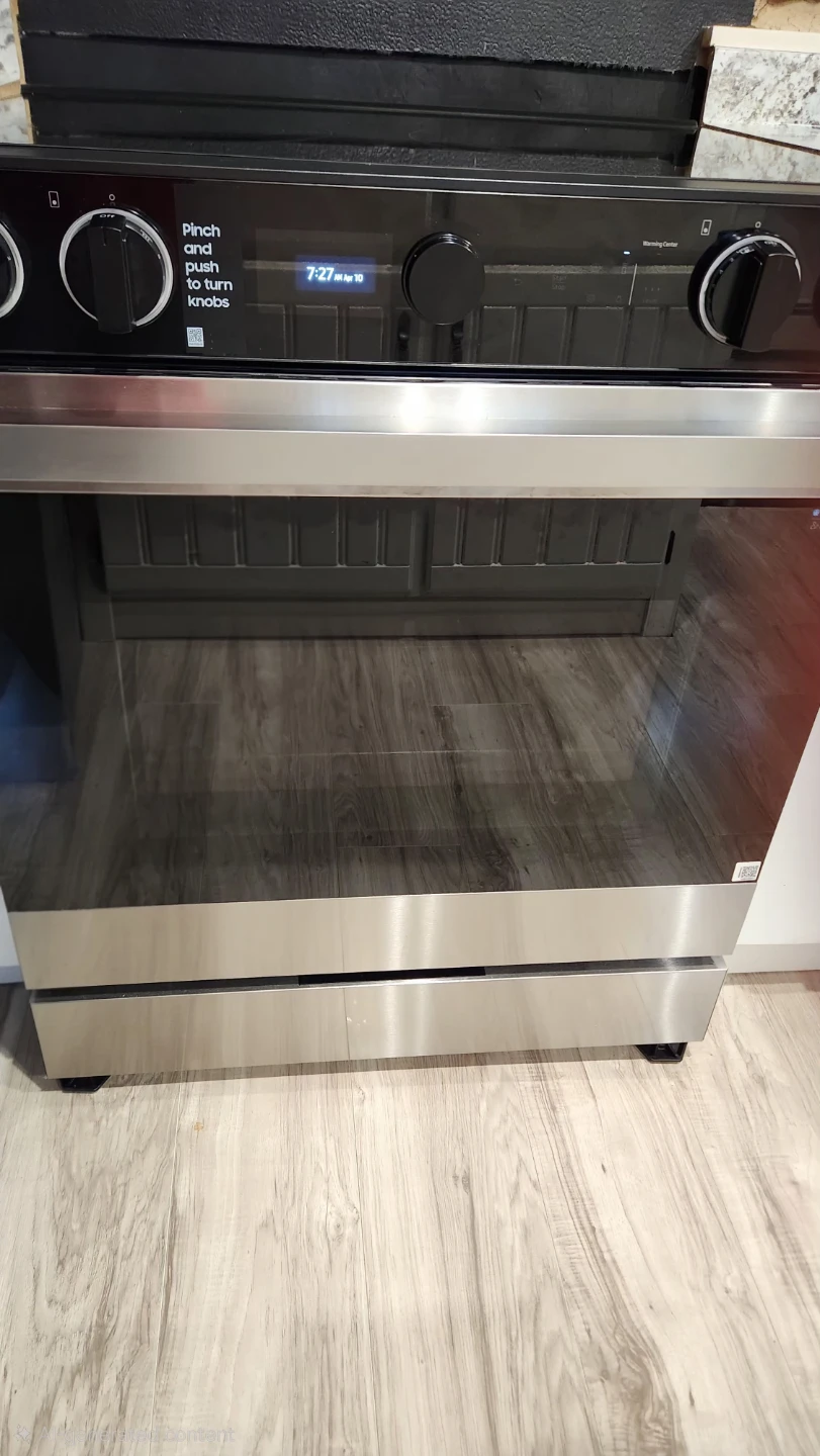 Samsung Stainless Steel Refrigerator & Electric Range with Oven - photo 4