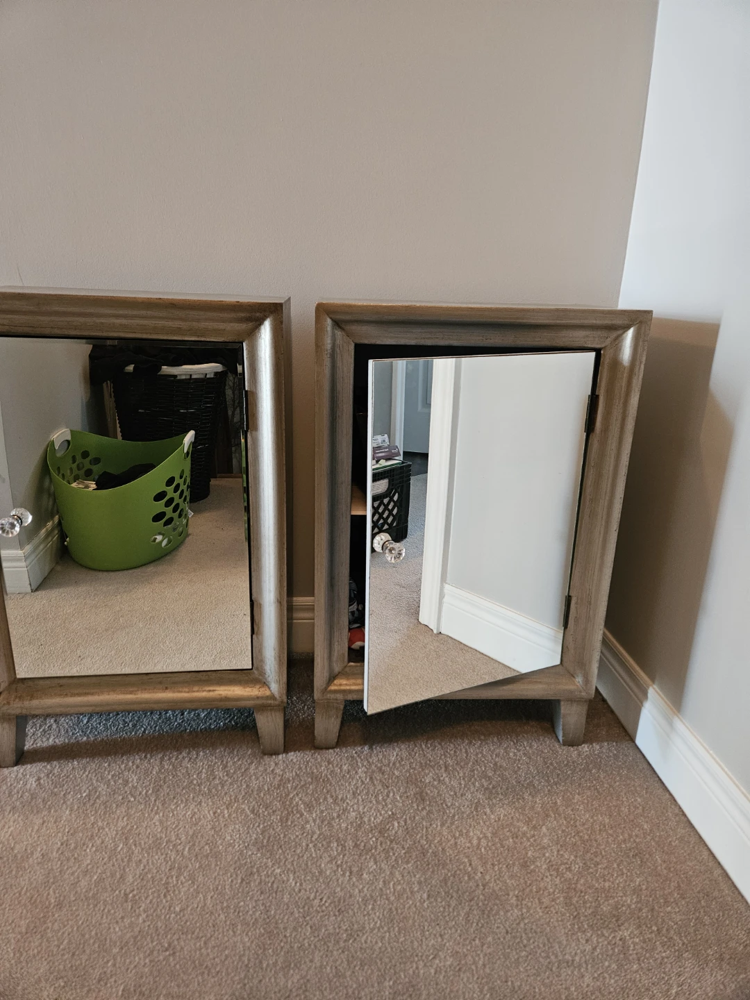 Two mirrored cabinet nightstands