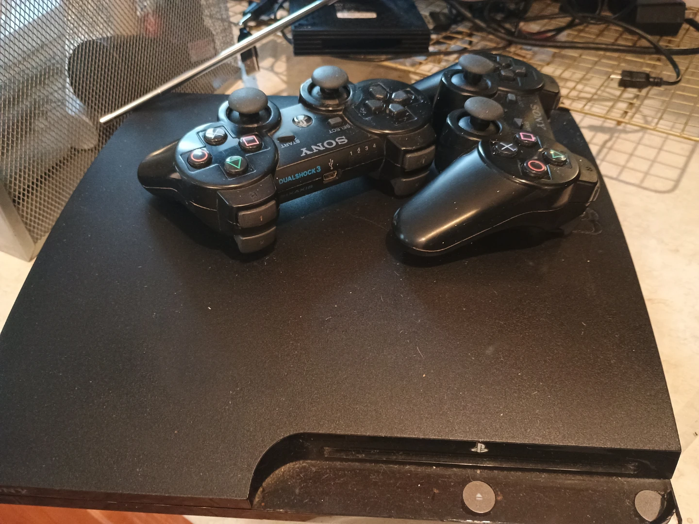 Sony PlayStation 3 Console with 4 Controllers