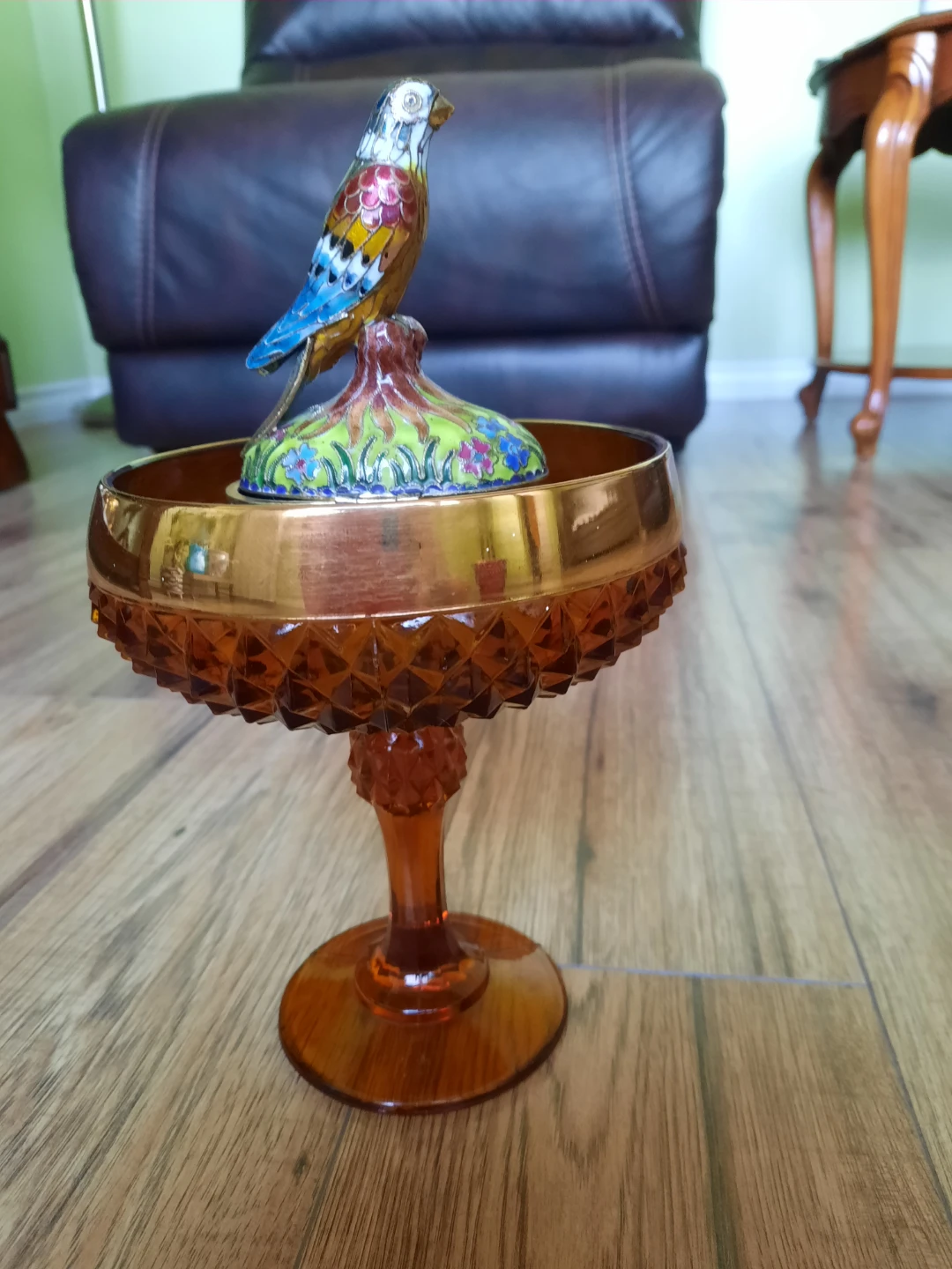 Amber glass compote dish with decorative bird lid