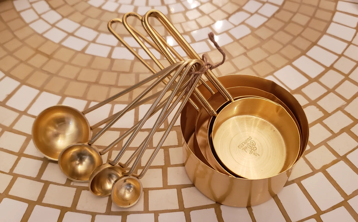 Set of Matching Gold Measuring Cups and Measuring Spoons
