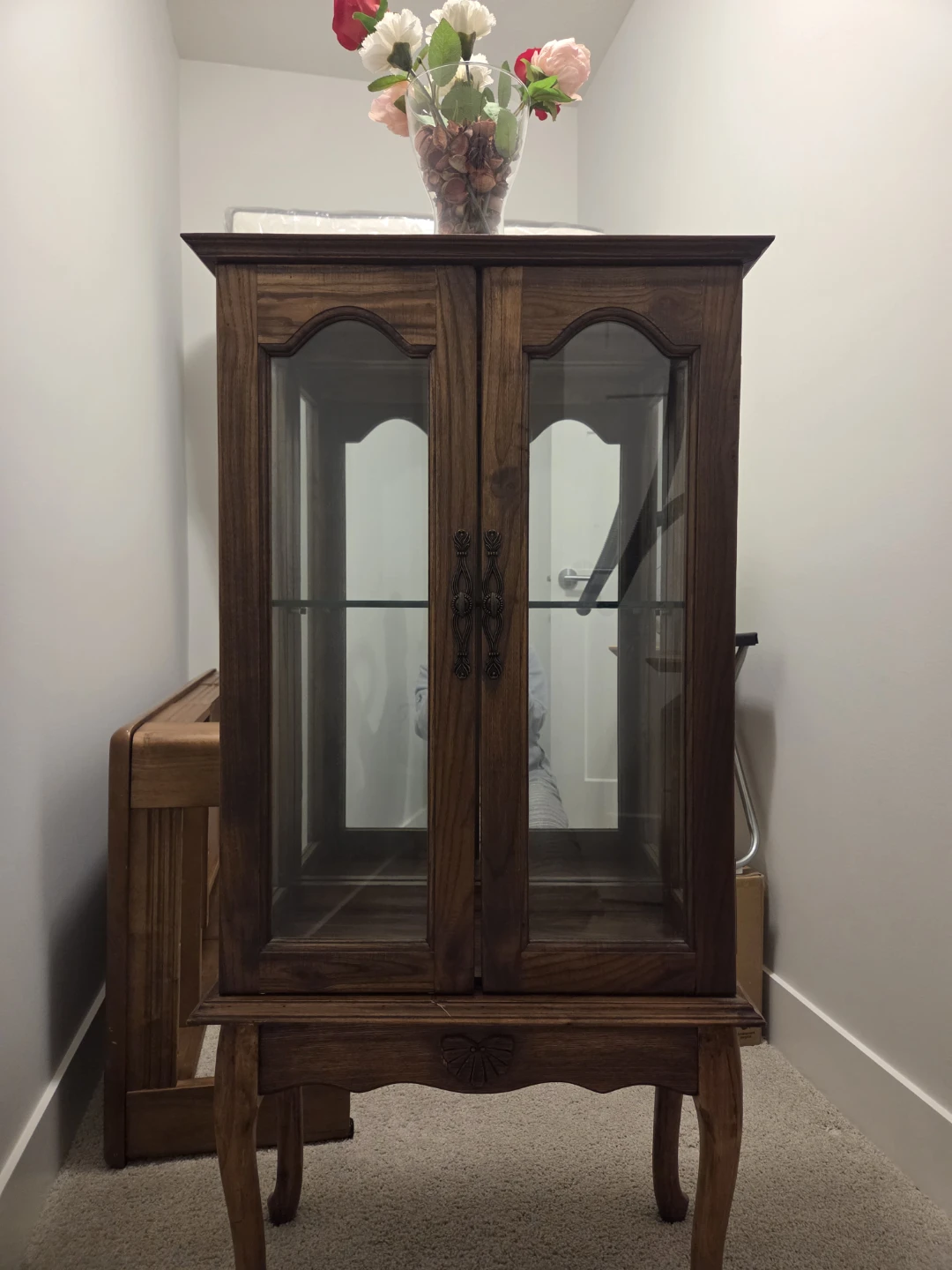 Wooden curio cabinet with glass doors - photo 2
