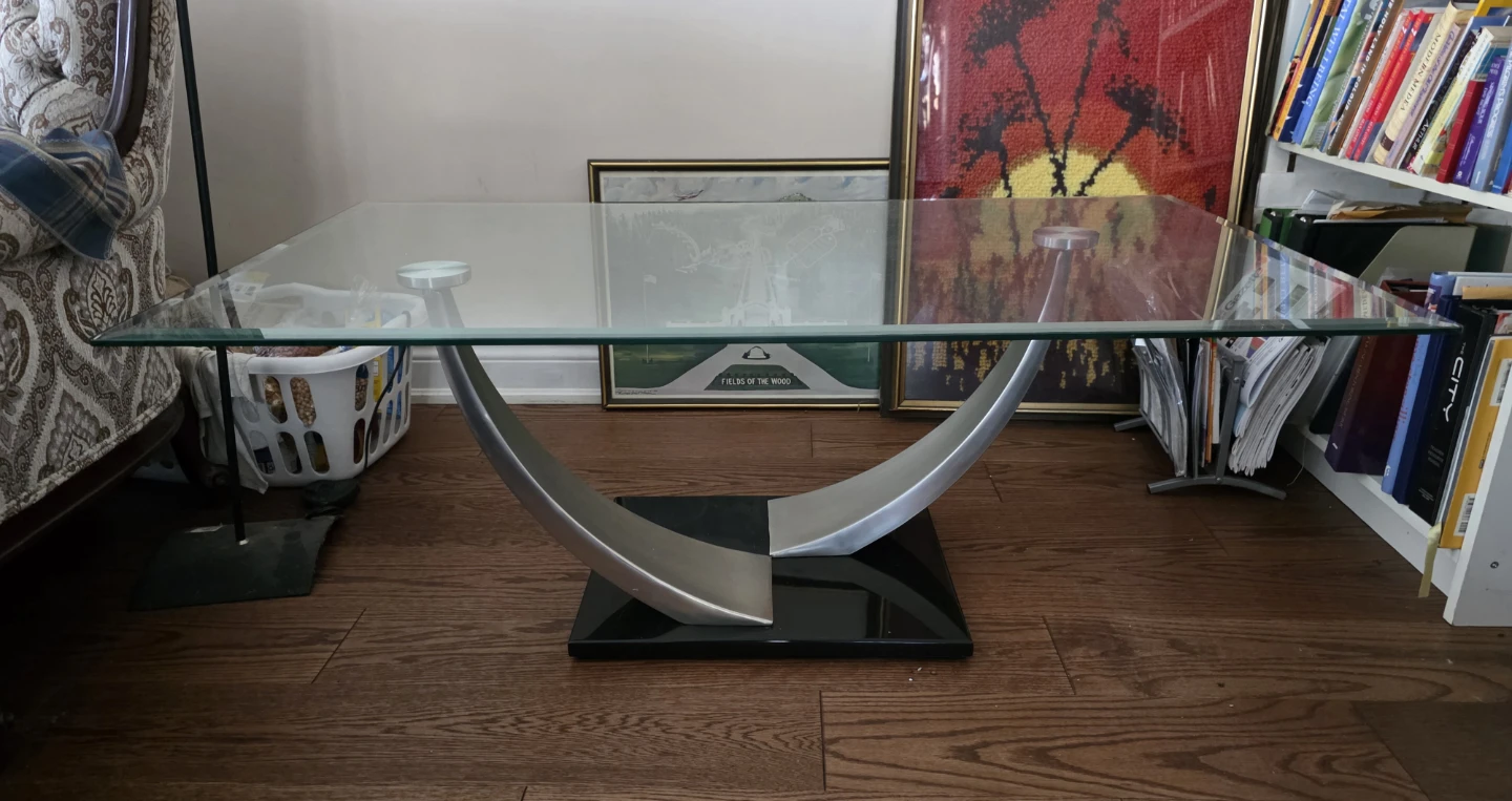 Modern Glass Coffee Table with Curved Metal Base!