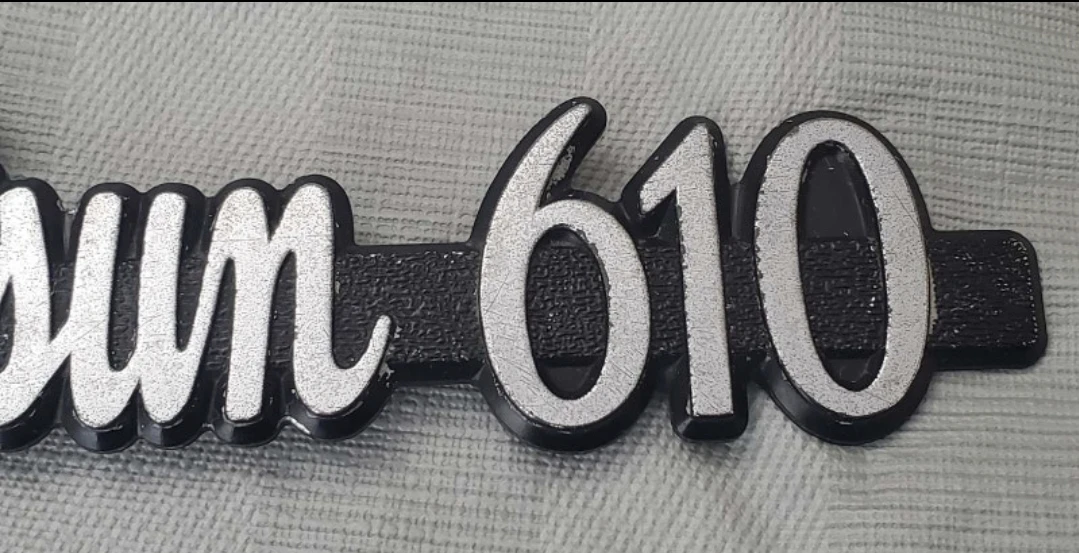 Vintage OEM original Datsun 610 plastic emblem - photo 3