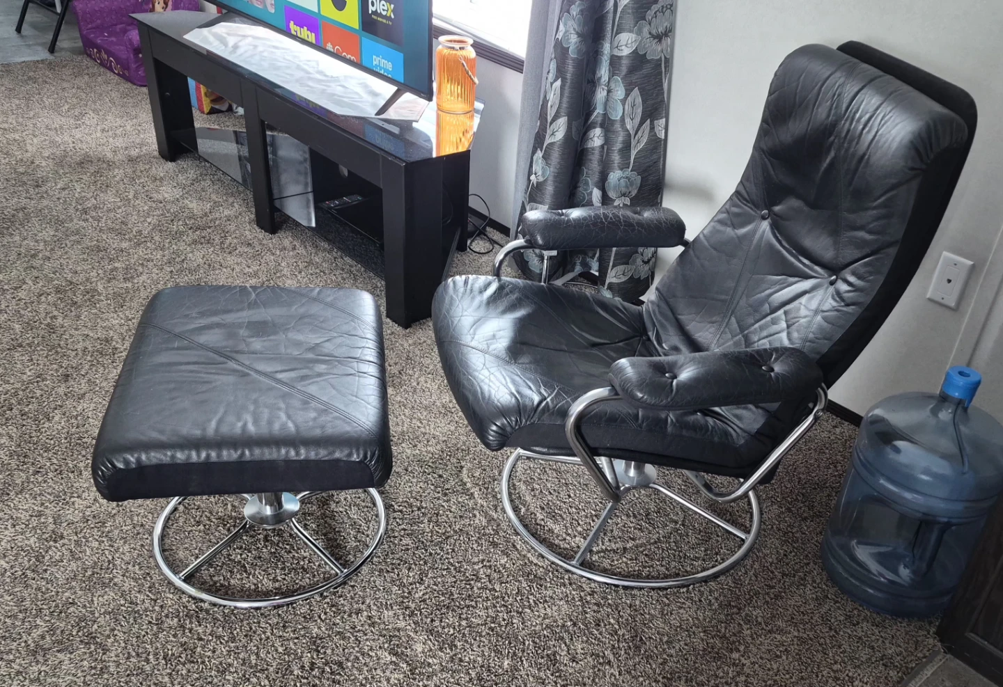 Black Leather Swivel Chair and Ottoman Set