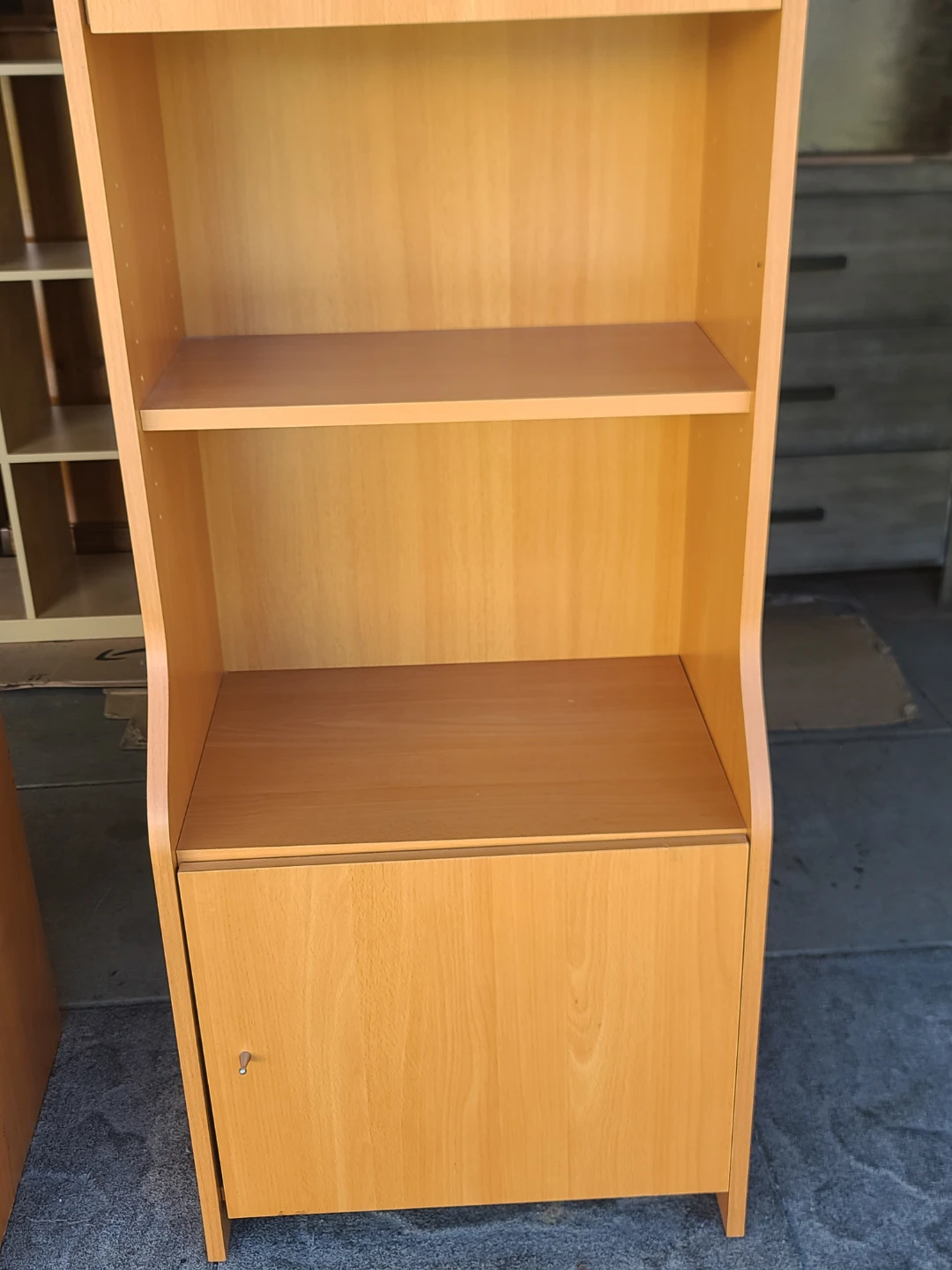 Pair of light wood bookcases with doors and shelves - photo 4