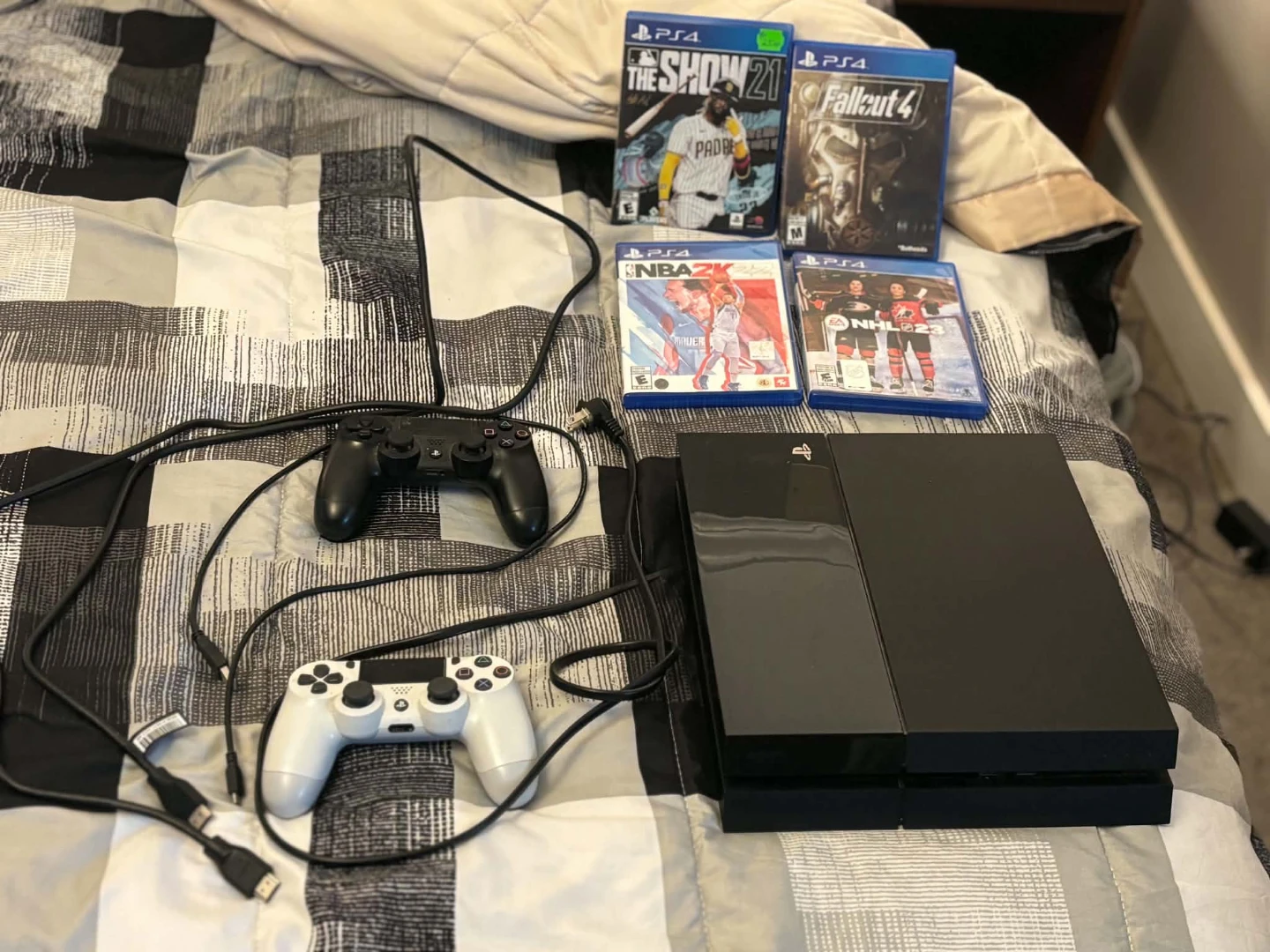PlayStation 4 Console with 4 Games and 2 Controllers