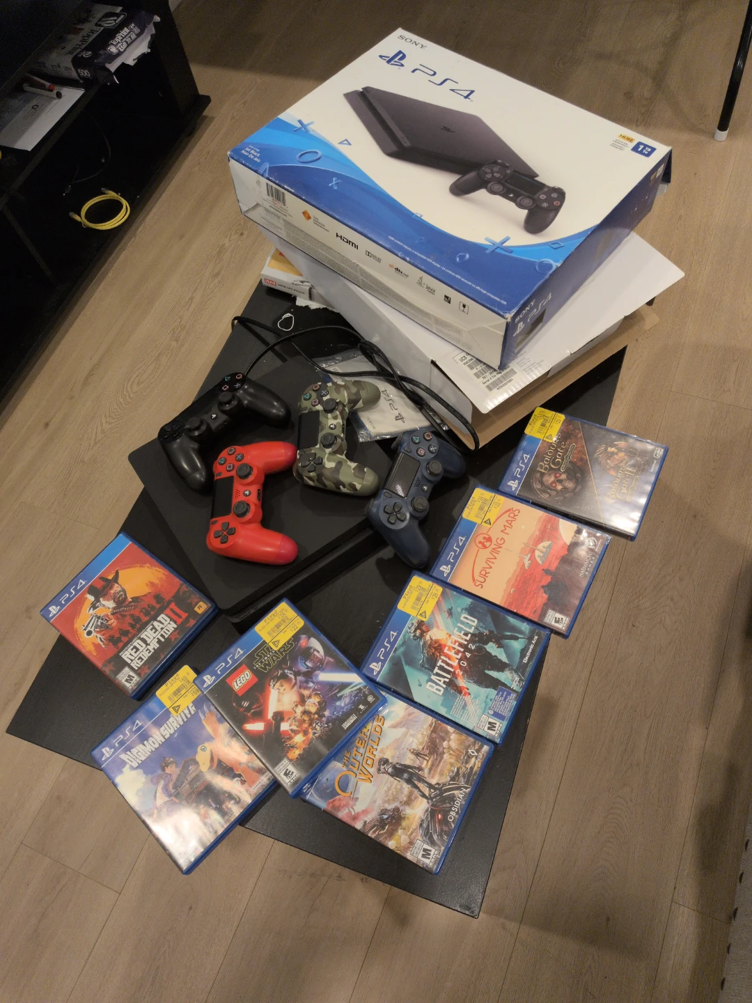 Sony PlayStation 4 (PS4) Console with Games and Controllers