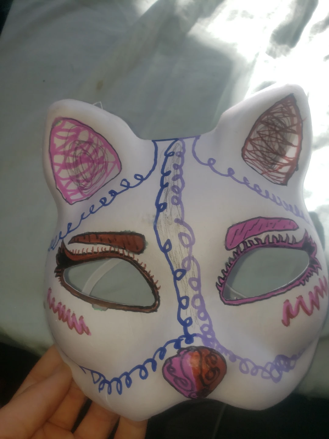 White, blue, purple, pink, and Brown Cat mask
