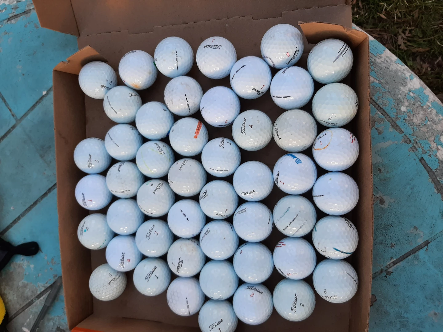 60 GENTLY USED TITLEIST GOLF BALLS