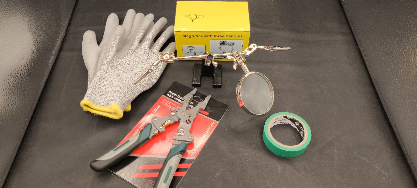 Magnifier with Three Handles and Tool Kit