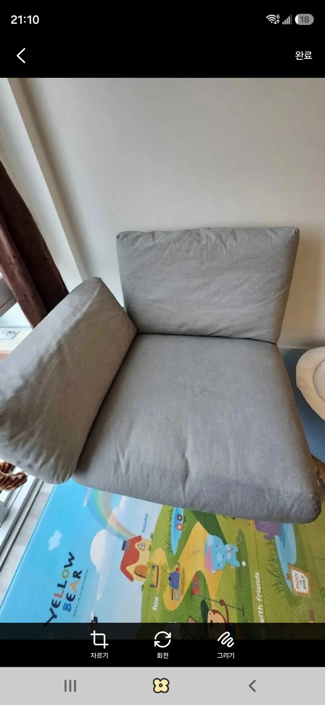 Ikea Blue Chair with Light Grey Pillows