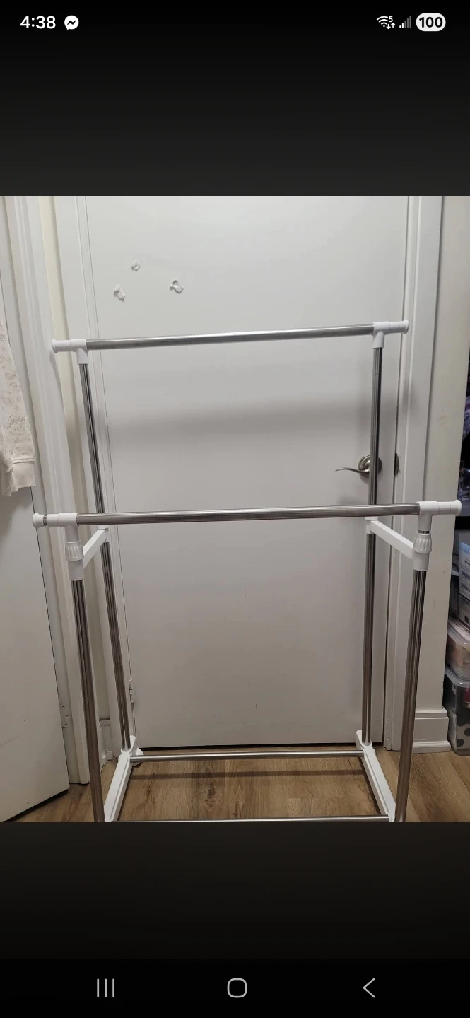 Double clothing rack with wheels