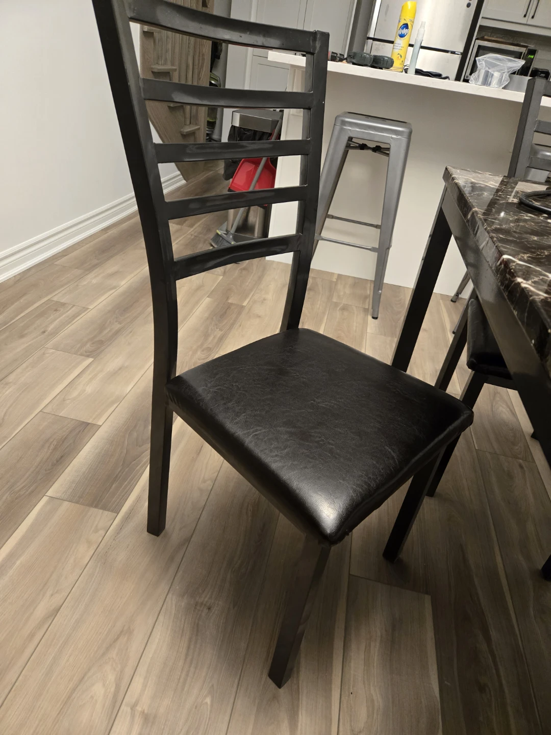 Black Faux Leather Dining Chairs and faux marble table