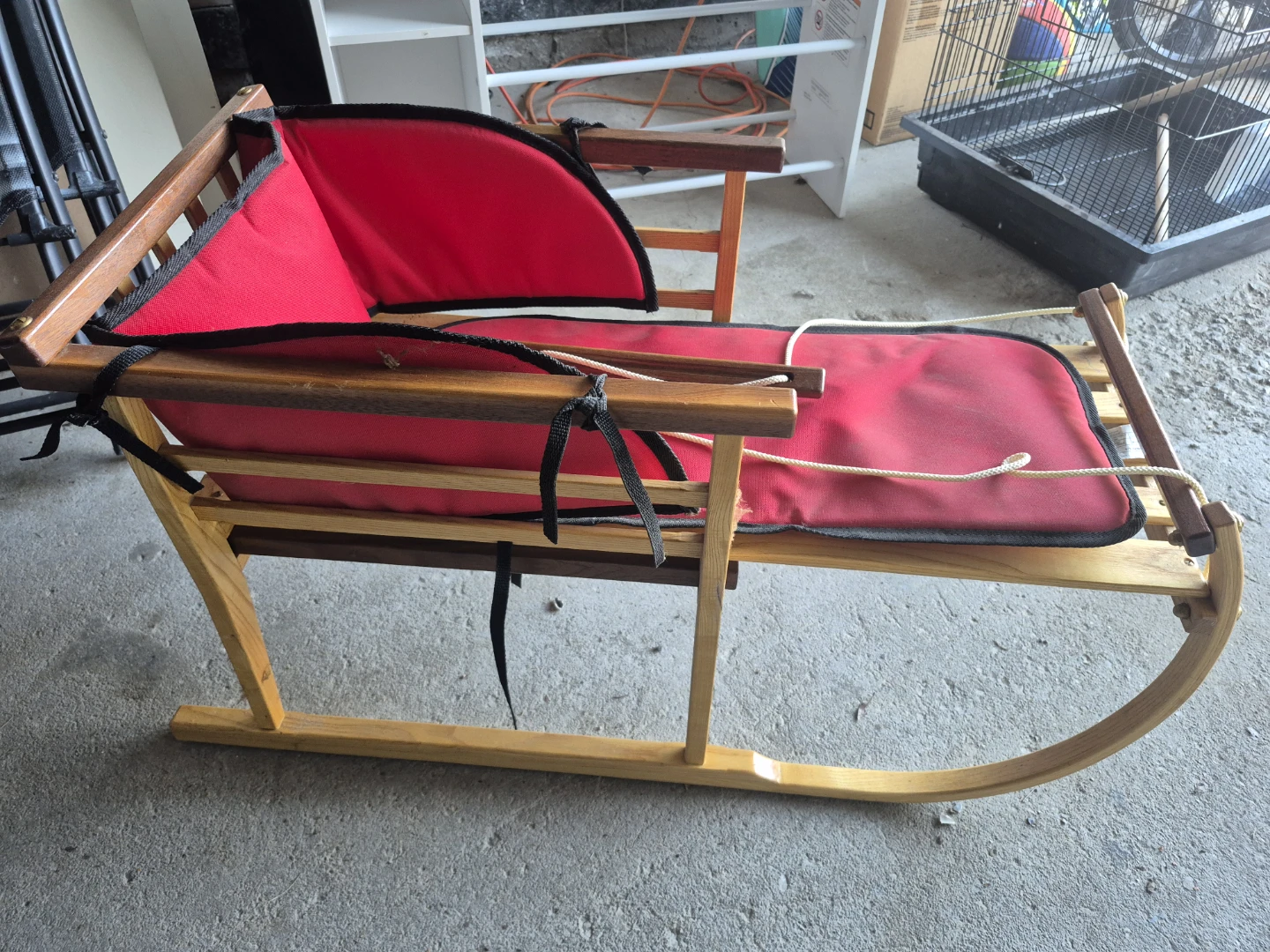 Wooden Joys Sled with Red Cushion
