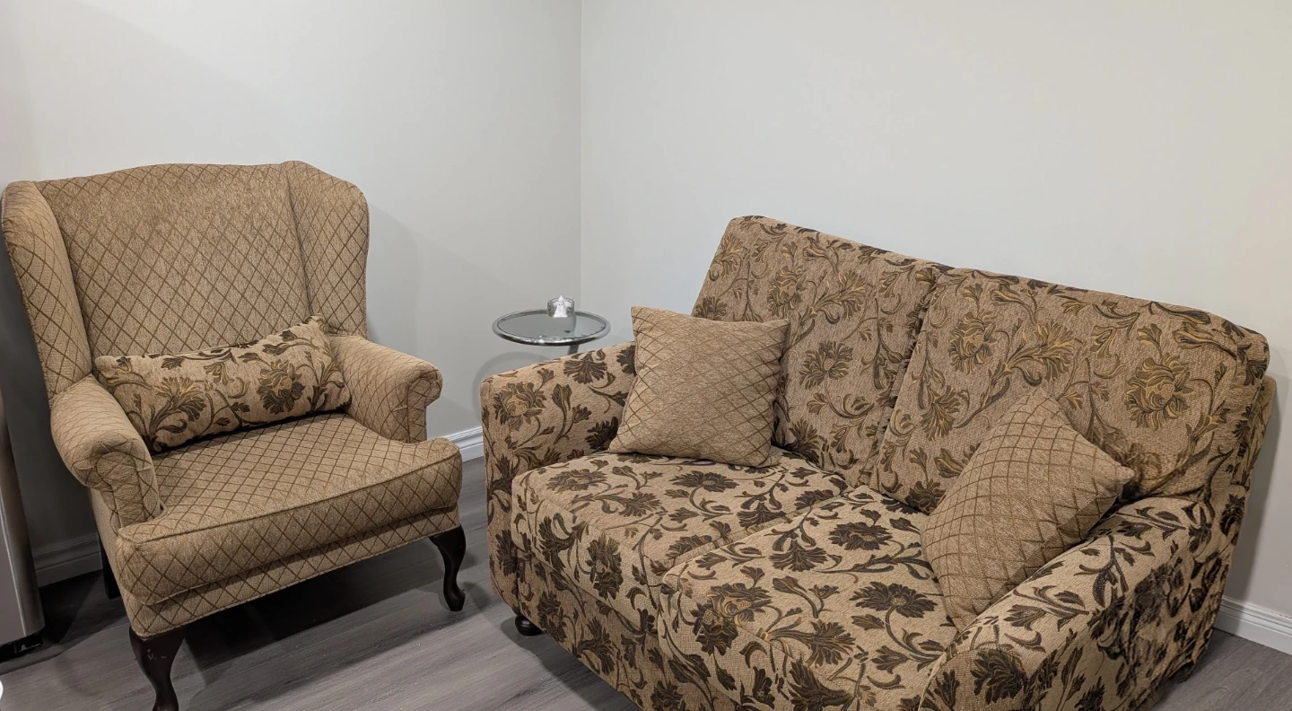 Tan Wingback Armchair with Decorative Pillow - photo 4