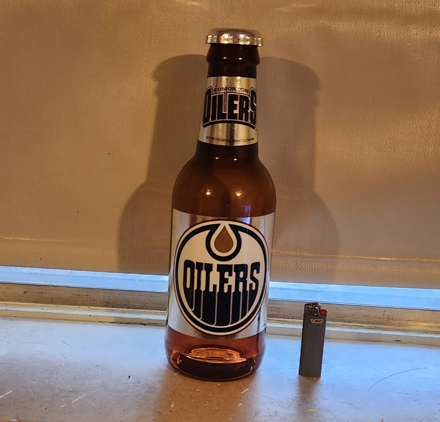 Oilers Beer Bottle Coin Bank 🌱