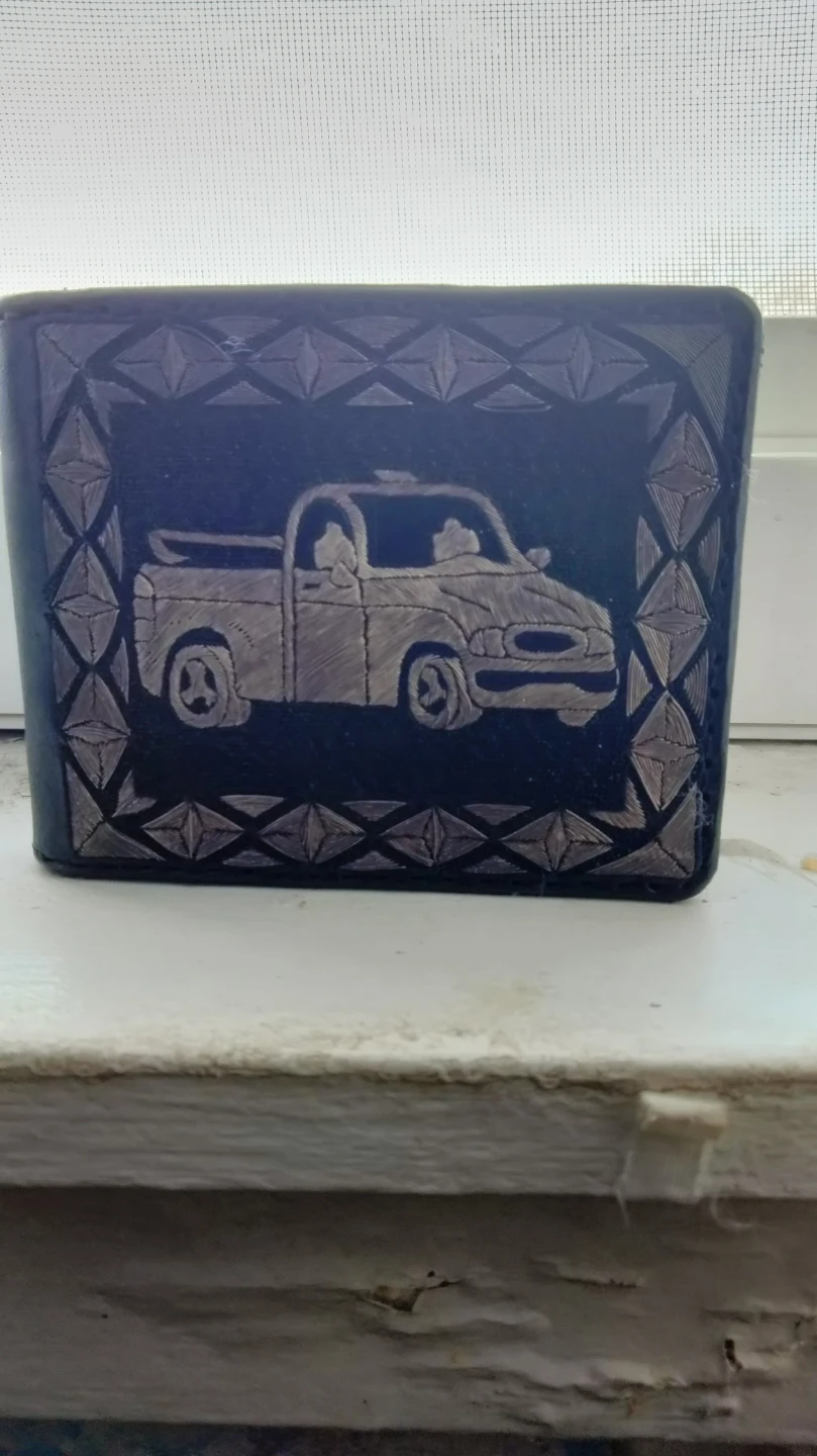 Se ve de cartera de piel bordada de hilo de plata